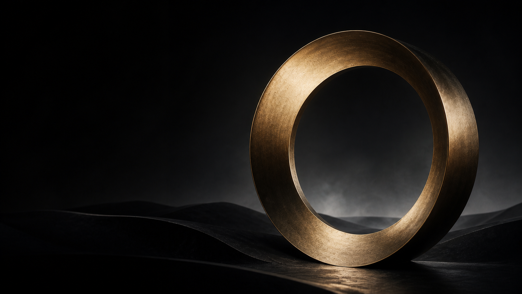A sculptural bronze ring, representing The Reserve